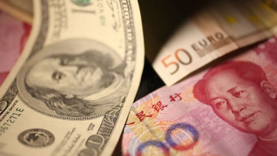 半岛电视台-面对贸易挑战中国通过稳定汇率来支撑人民币