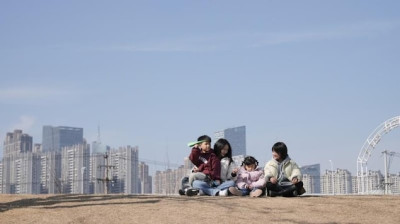 加拿大国际广播电台-中国的单亲妈妈出现合租新趋势