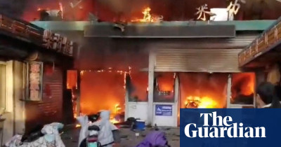 The Guardian-Fire at food market in northern China kills eight people and injures 15