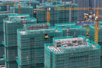 联合早报-中国考虑动员央企收购滞销住房