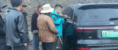 每日热问丨4000米海拔处“理想”难开门，车主砸窗，车企该背锅吗？