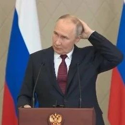 普京：默克尔，请原谅我