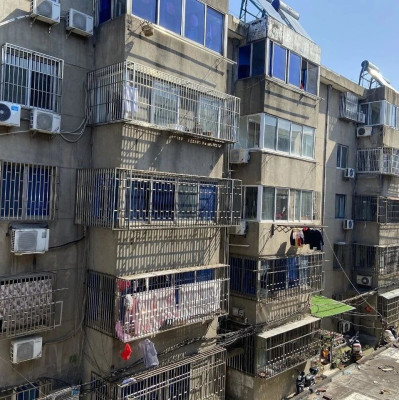 每日热问｜把居住体验不好的老旧小区推翻重建为高层，会实现双赢吗？