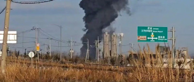 韩国一客机着陆时撞墙起火 已致23人死伤