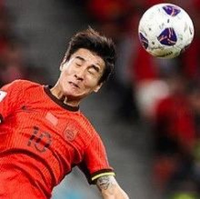 “国足踢得不错，值得往下看看”